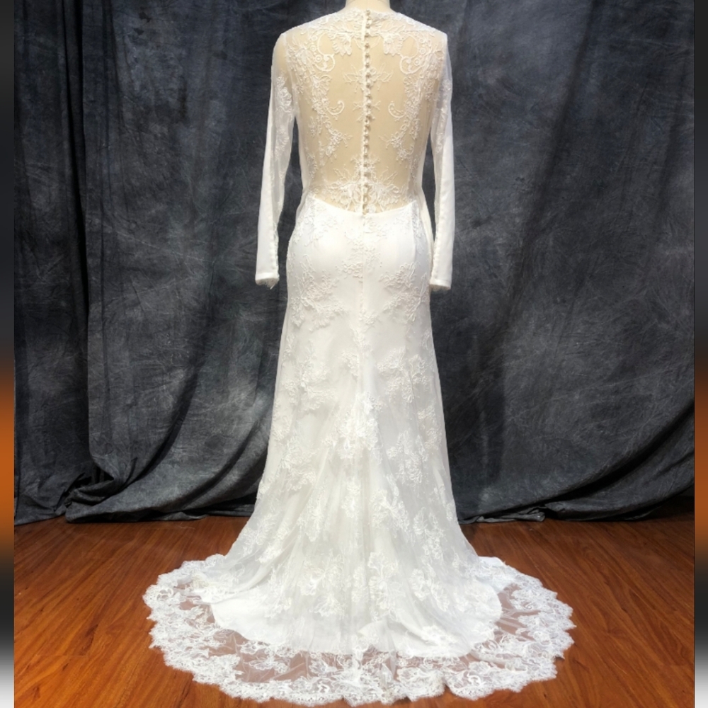 Custom made fit and flare wedding gown in ivory